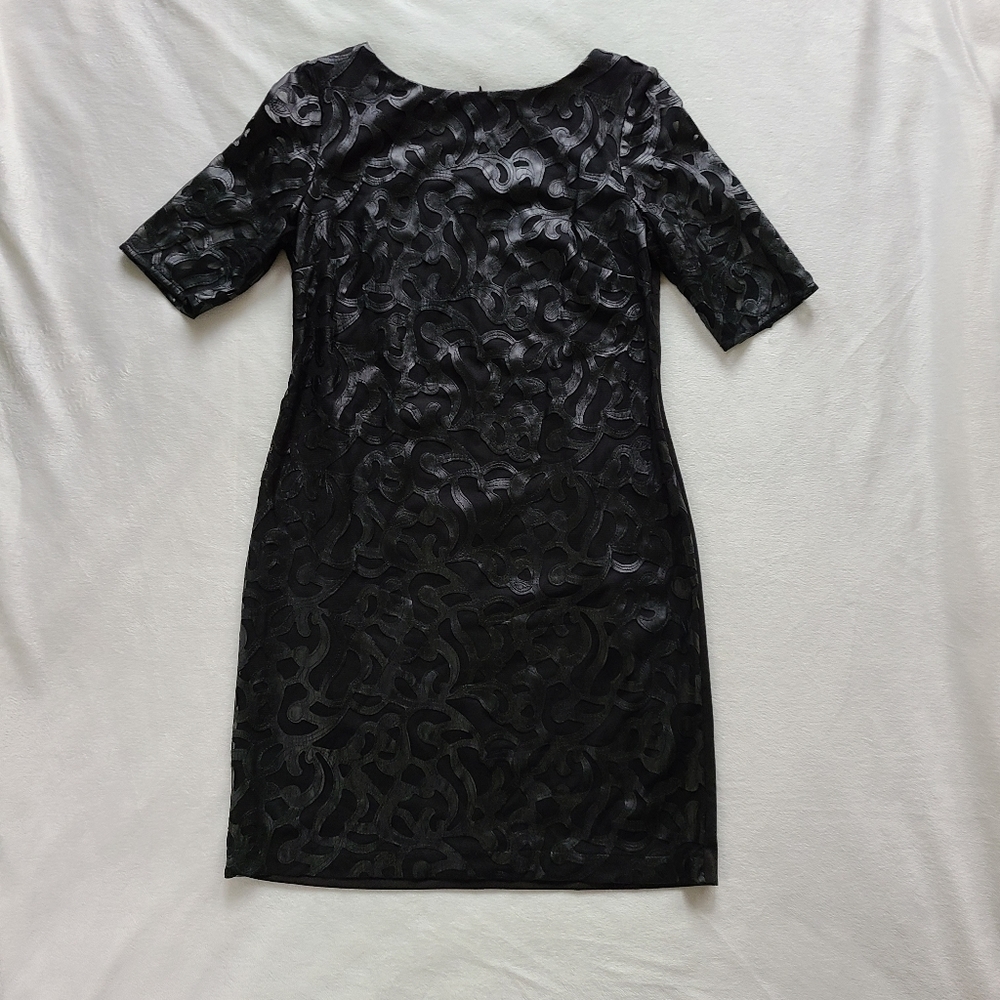 Evening dress with faux leather on mesh overlay